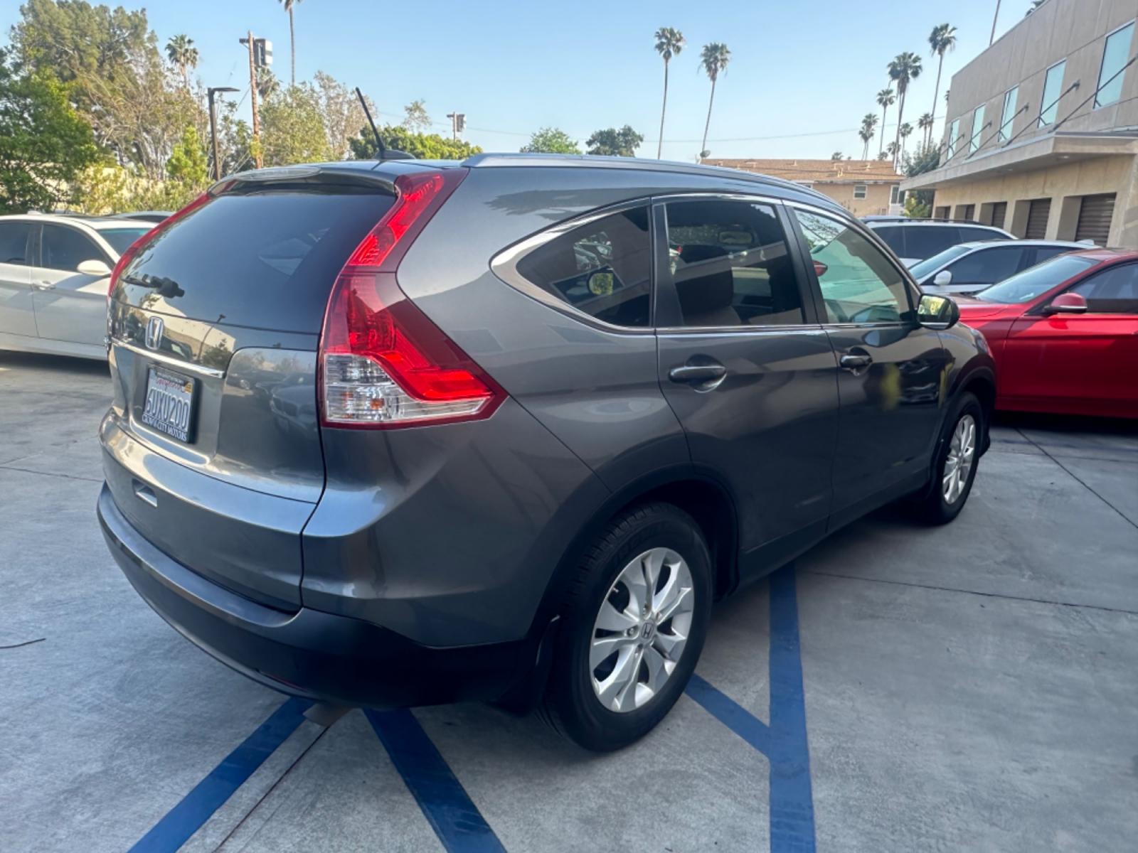 2012 Grey /Gray Honda CR-V EX-L 2WD 5-Speed AT (JHLRM3H78CC) with an 2.4L L4 DOHC 16V engine, 5-Speed Automatic transmission, located at 30 S. Berkeley Avenue, Pasadena, CA, 91107, (626) 248-7567, 34.145447, -118.109398 - Moon-roof! Leather seats! This 2012 Honda CR-V EX-L 2WD 5-Speed AT looks and drives good. - Photo #4